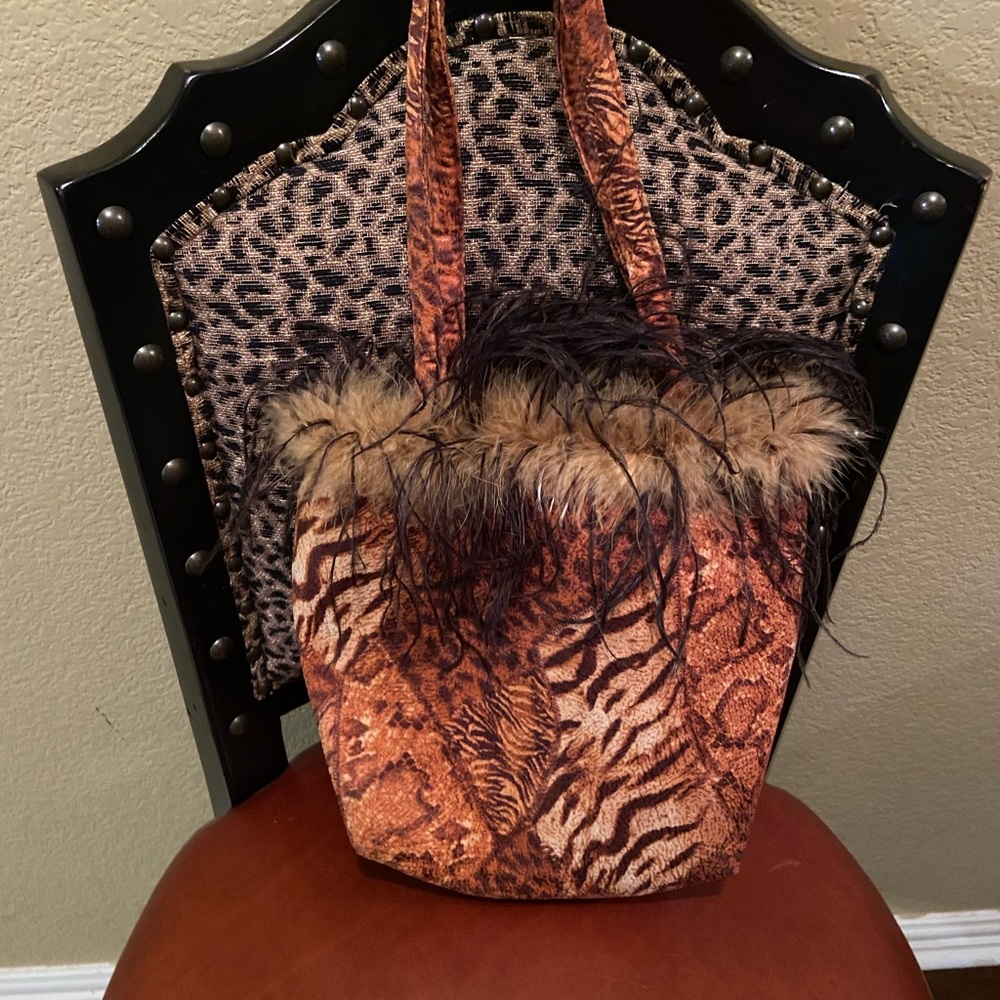 Leopard print feathered handbag